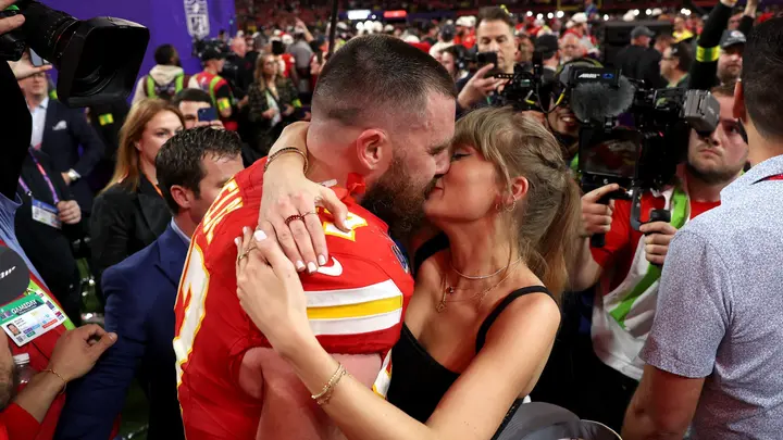 Baltimore Ravens head coach John Harbaugh is optimistic about the Travis Kelce-Taylor Swift relationship