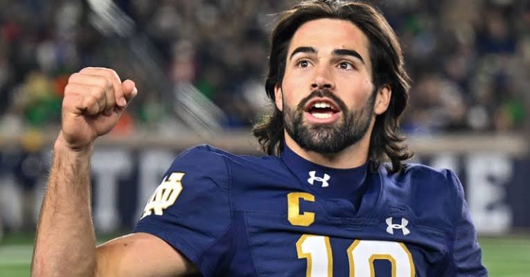 Breaking: Sam Hartman,former    Notre Dame Quarterback and College Football Hall of Famer, Takes on New Role in the NCAA – A Distinguished Alumni of the University of  Notre Dame and a former Standout Player in the NFL is set to Return to College Football as the New…..read more..